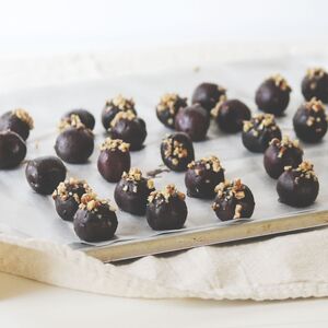 Carob coated cherries with walnuts