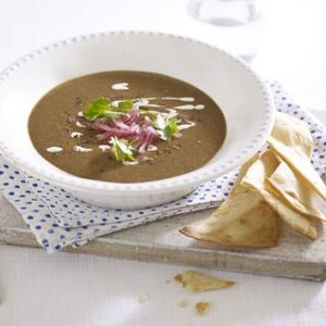 Chipotle black bean soup with lime-pickled onions