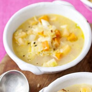 Chunky root vegetable soup with cheesy pesto toasts