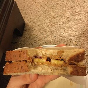 Peanut butter, honey, banana and jelly sandwich