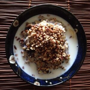 Raisin, pecan, and banana oatmeal with flax seeds