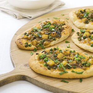 Spicy pizza breads with raita salad