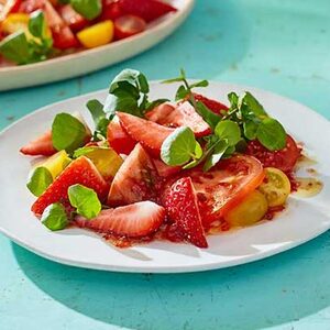 Strawberry, tomato & watercress salad with honey & pink pepper dressing