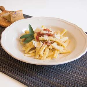 Strozzapreti Pasta with Prosciutto Crudo and Fontina