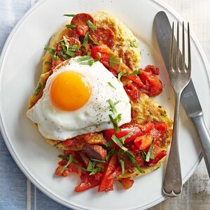 Sweetcorn pancakes with fried eggs & chorizo salsa