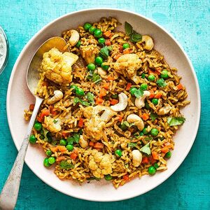 Vegetable biryani with green raita