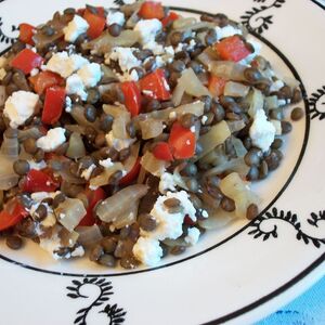 Warm lentil and goat cheese salad