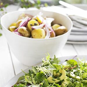 Zingy new potato salad